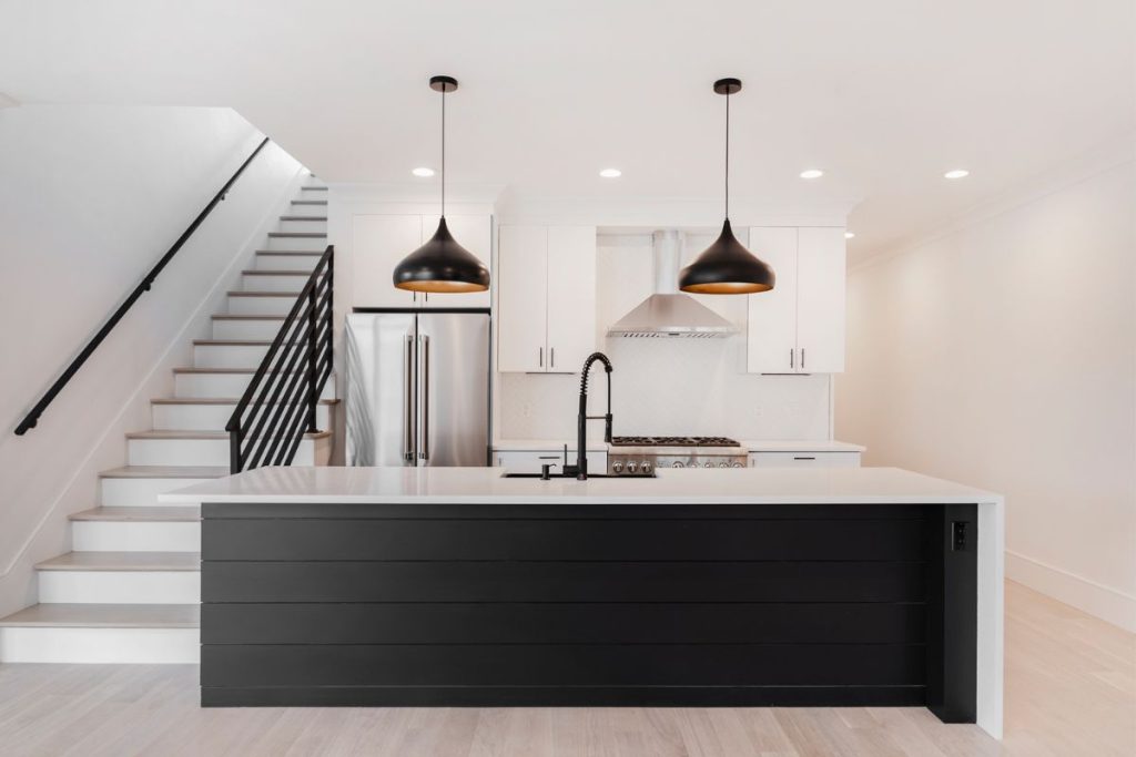 South Boston condo with black and white sleek kitchen