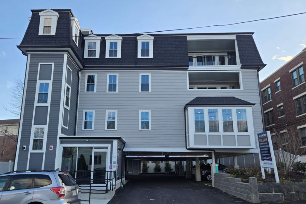 Exterior of apartment building Quincy Center designed by architects