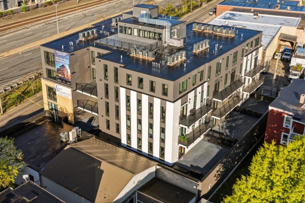 Large block of architect designed luxury apartments in Brighton MA right off the Mass Pike