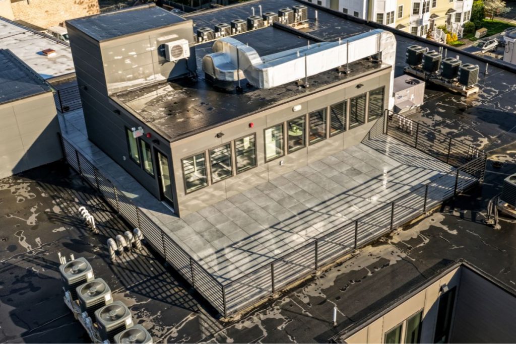 Roof deck on Brighton architect designed condo and mixed use building